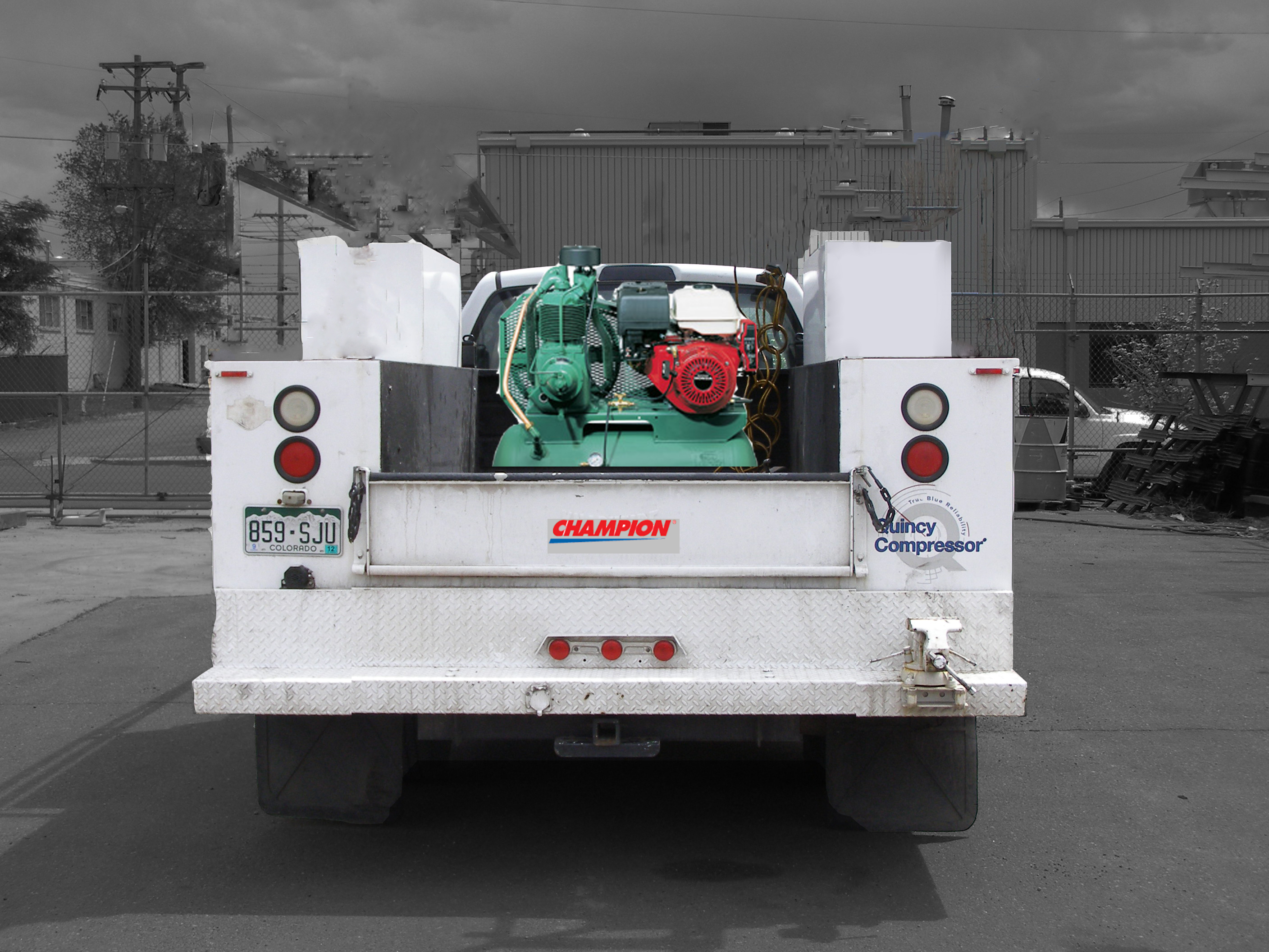 Service truck with Champion compress in bed